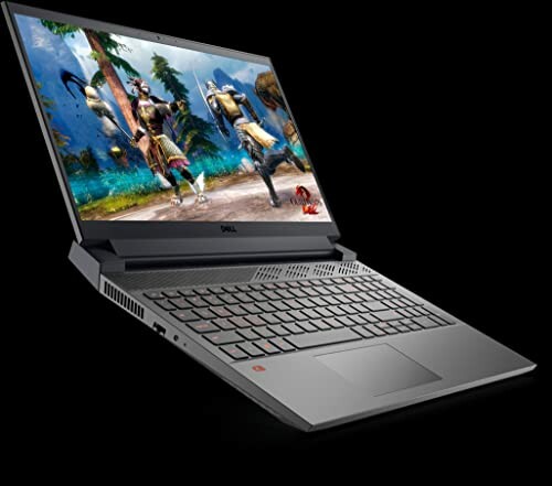 Dell gaming laptop with action game on screen