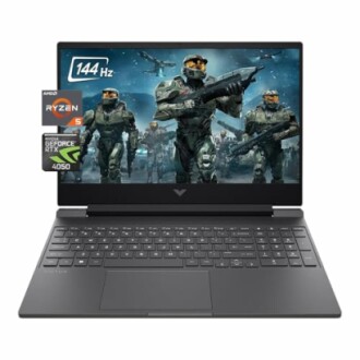 Gaming laptop with AMD Ryzen 5 and NVIDIA GeForce RTX 4050 graphics, displaying a military-themed game on screen.