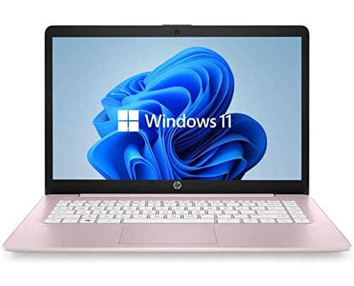 Pink HP laptop with Windows 11 displayed on screen.