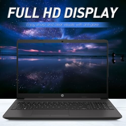 Laptop with full HD display showing a scenic night sky.