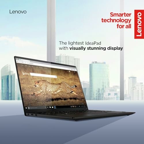 Lenovo IdeaPad with cityscape background and cheetah display