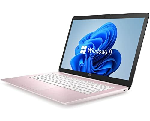 Pink laptop with Windows 11 on screen