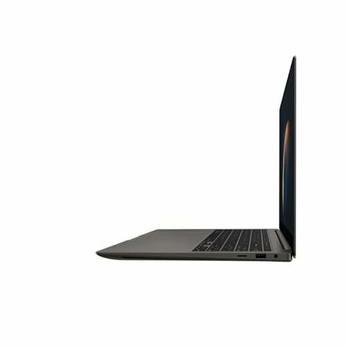 Side view of a slim laptop with a dark finish.