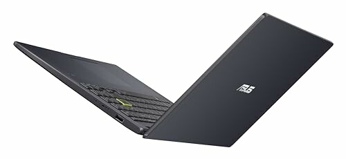 Open laptop with a sleek design, viewed from the side.