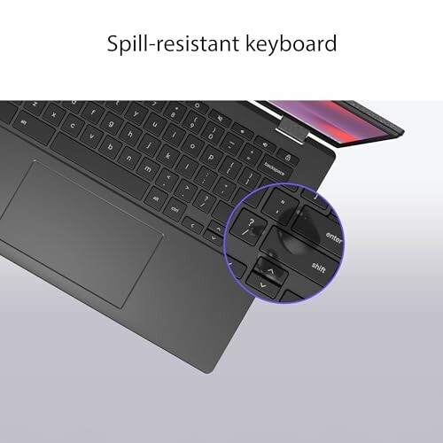 Laptop with spill-resistant keyboard feature highlighted.