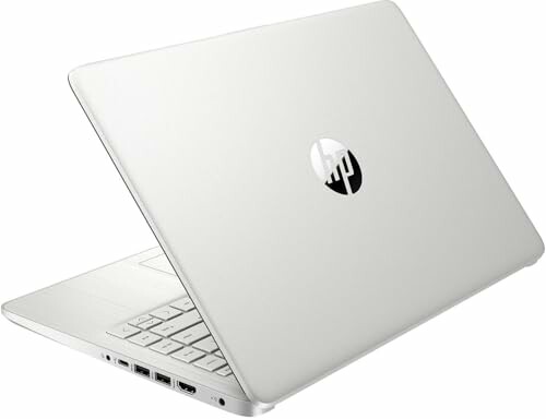 White HP laptop partially open