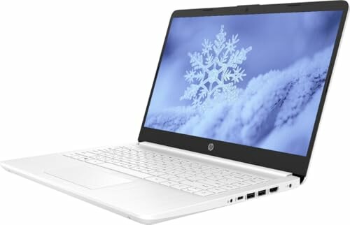 White laptop with snowflake on screen