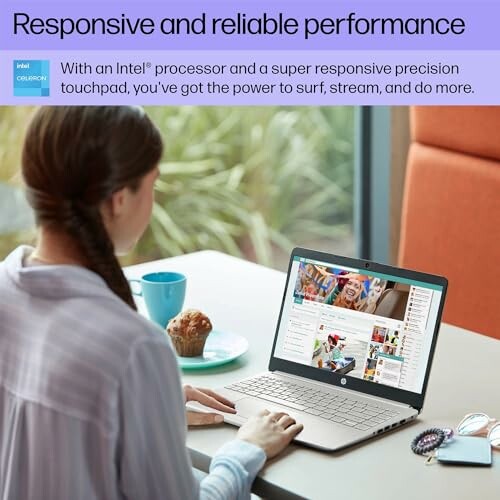 Woman using laptop with Intel ad about responsive performance